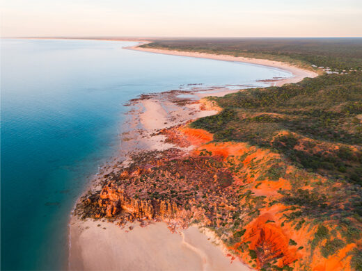 Eco Beach Mini Bungles at Sunset from a drone available as a fine art photo print framed or canvas