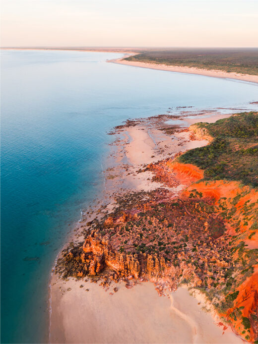 Eco Beach Mini Bungles at Sunset from a drone available as a fine art photo print framed or canvas