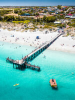 A summers day at Coogee Beach Jetty in South Fremantle taken from drone available for purchase as a framed or canvas print
