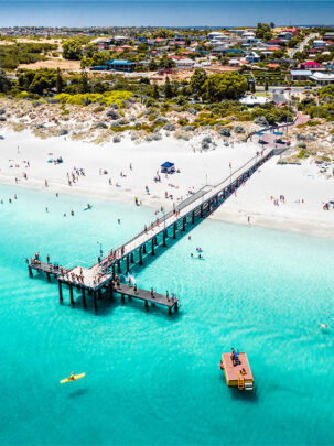 A summers day at Coogee Beach Jetty in South Fremantle taken from drone available for purchase as a framed or canvas print