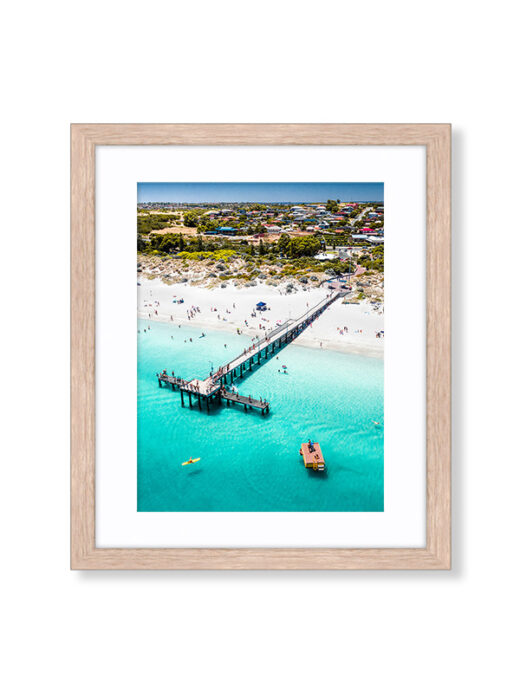 An Aerial Drone Photo of Coogee Beach Jetty in Perth Western Australia. Available as a fine art framed photo print.