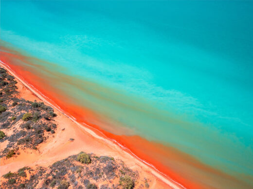 Simpsons Beach in Roebuck Bay at high tide red dirt sand blue water broome western australia fine art photo print framed or canvas matt deakin from miles away photography